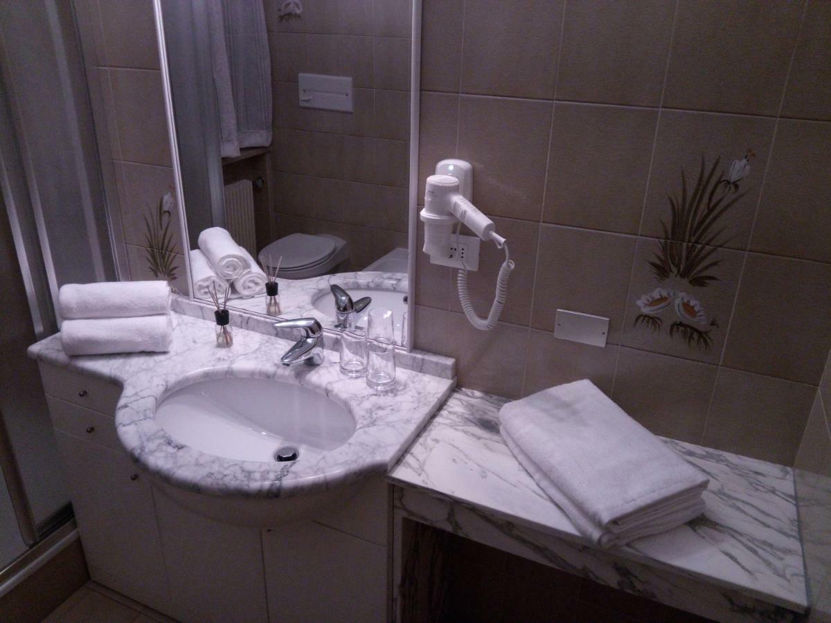 אורטיסיי Holiday Apartments Costanzi מראה חיצוני תמונה